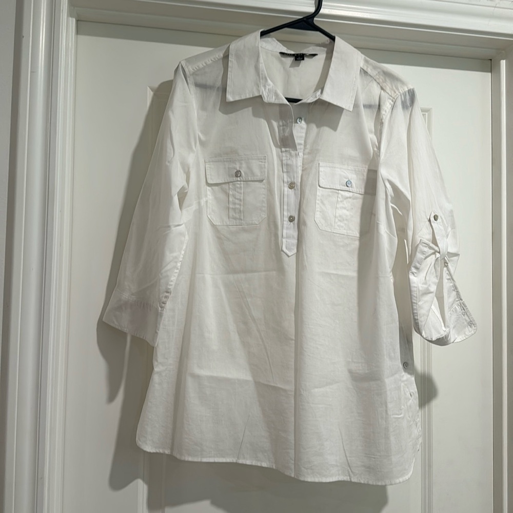 Women’s white 3-4 sleeve shirt.